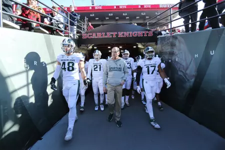 Coach Dantonio and team at Rutgers