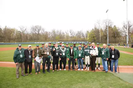 1954 College World Series team - April 27, 2019 - first pitch vs Northwestern