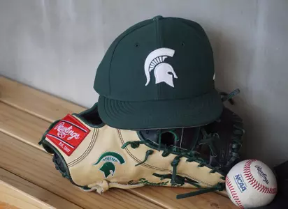 Baseball hat, glove and ball