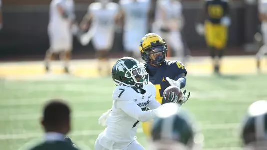 Ricky White action at Michigan