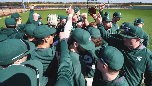 Team huddle vs Morehead State at Shipyard Park