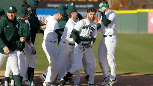 Zach Iverson, team walk-off celebration over Kansas in Greenville