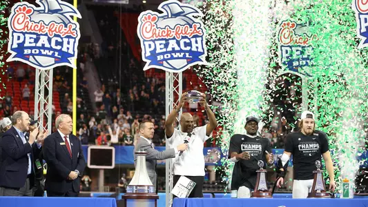 Coach Tucker, Jayden Reed and Cal Haladay Peach Bowl Celebration