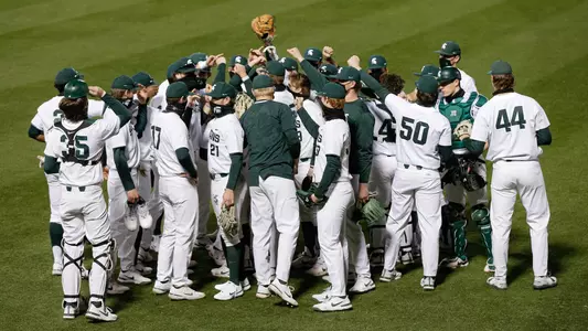 Team huddle vs Maryland in Greenville at Fluor Field