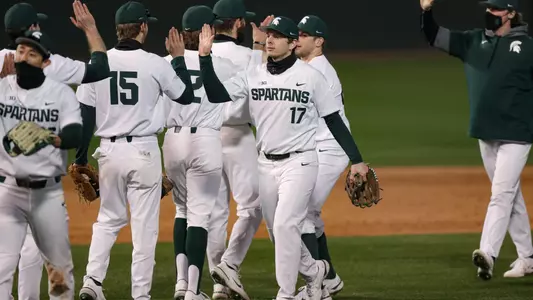 Team high fives celebration at Greenville