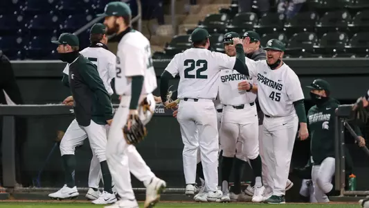 Team celebration vs Maryland at Greenville