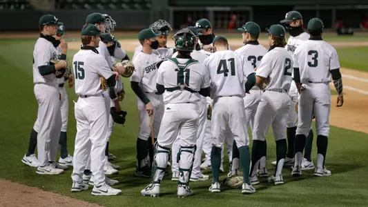 Team huddle vs Maryland in Greenville at Fluor Field