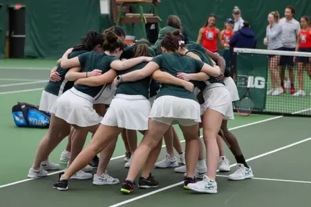 Team Huddle vs. Arizona on Feb. 9, 2022