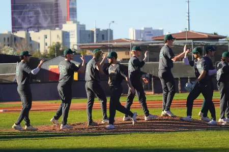 Team high fives celebration at UNLV 2022