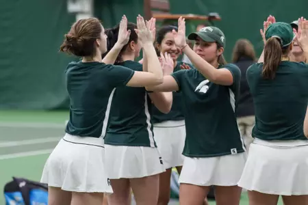 Team Celebration vs. Arizona on Feb. 9, 2022