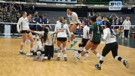 Team celebration, volleyball, 2023, vs. #13 Penn State