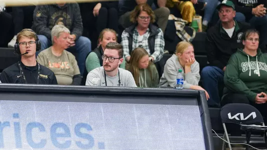 Austin Overmann AthComm action photo