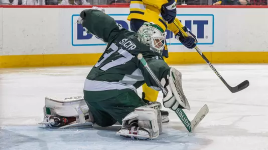 DETROIT, MI - FEBRUARY 11: during the third period of an NCAA Men’s college hockey Dual in the D game at Little Caesars Arena on February 11, 2023 in Detroit, Michigan. The Wolverines defeated the Spartans 4-3 in O.T. (Photo by Dave Reginek/Getty Images) *** Local Caption ***