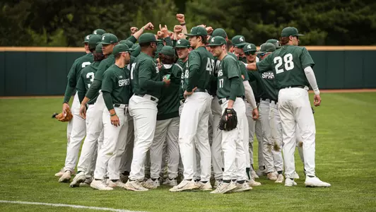 Team huddle Spartan Senior Day