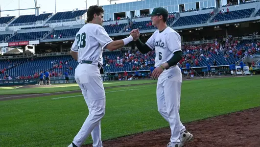 Brock Vradenburg and Wyatt Rush high five B1G Tournament