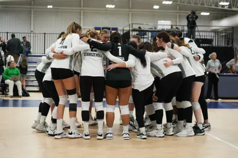 Team huddle, volleyball, 2023, Brown