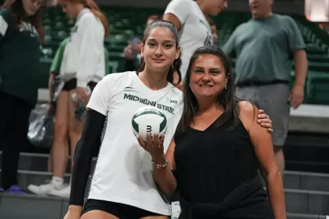 Nil Okur and Family, volleyball, 2023, Syracuse