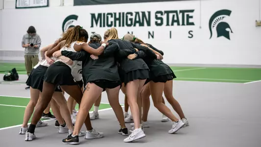 Women's Tennis team huddle