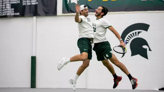 Ozan Baris and Ronald Hohmann III Celebrating