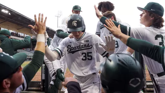 Randy Seymour team dugout celebration at Fluor Field