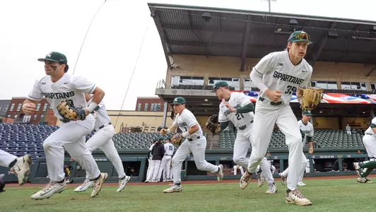 Team running out to take field at Fluor Field in Greenville SC