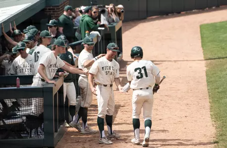 Team, dugout, high fives