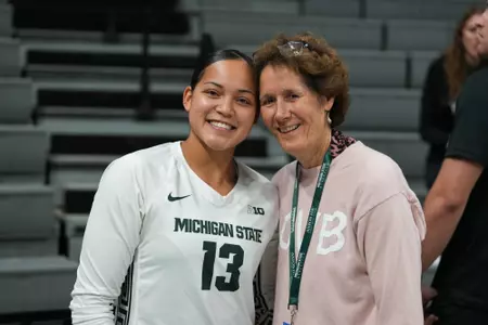 Aliyah Moore and Kathy DeBoer '78, volleyball, 2023