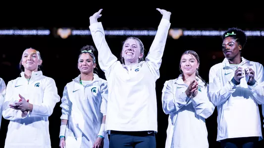 DK2401-01 0050
DK2401-01 MSU wGYM Sprouts Farmers Market Collegiate Quad
MSU’s women’s gymnastics team competes in a collegiate quad event against BYU, NC State, and CAL in West Valley City, Utah. Michigan State took second overall after competing in the uneven bars, beam, floor, and vault events. 
January 13, 2024
Photo by Donovan Kelly