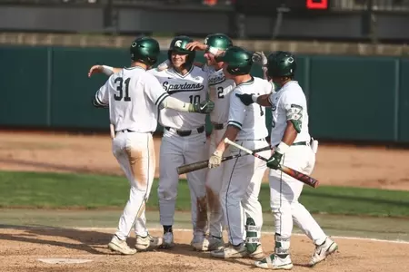 Greg Ziegler HR celebration with teammates