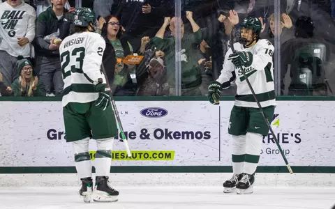 Shane Vansaghi and Ryker Lee, hockey, action, 2025-26