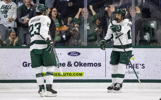 Shane Vansaghi and Ryker Lee, hockey, action, 2025-26