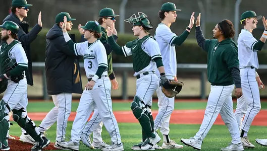 Team high five line vs Western Michigan