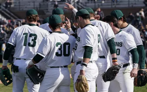 Group huddle vs Michigan