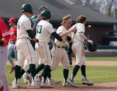 celebration after Dayton Murphy gives MSU run-rule walk-off