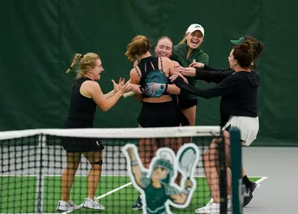 women's tennis team celebration