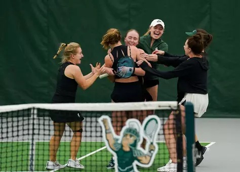 women's tennis team celebration