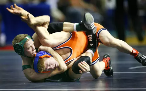 Michigan State's Nick Simmons, left, controls David Marble of Bucknell Thursday evening during the second round of the NCAA Championship at the Palace of Auburn Hills. Simmons defeated Marble 7-0 and will compete Friday morning in the quarterfinals. John Gwillim/Michigan State Sports Information