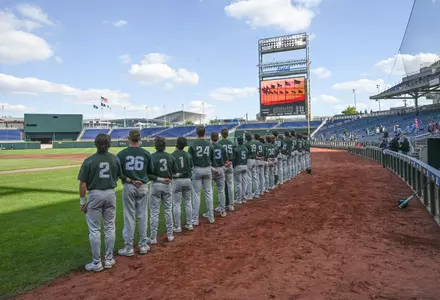 Team line up national anthem at B1G Tournament Charles Schwab Field