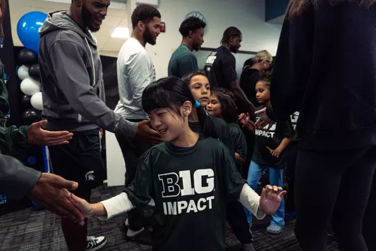 MSU Athletics student-athletes welcome Pattengill students to their new space as part of the B1G Build Initiative Project unveiling ceremony.