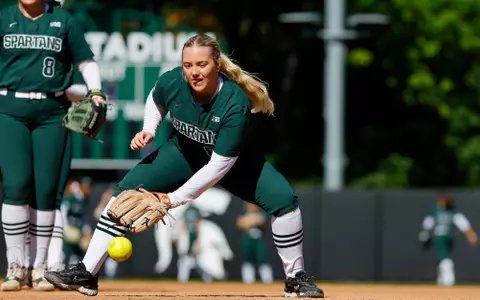 Violet Flynn warms up before a game at Secchia Stadium