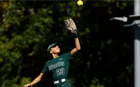 Ella Girard fields a fly ball at Secchia Stadium