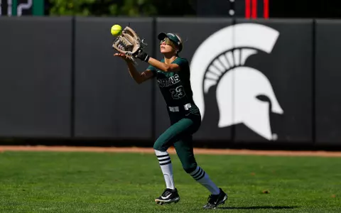 Ella Girard fields a fly ball at Secchia Stadium