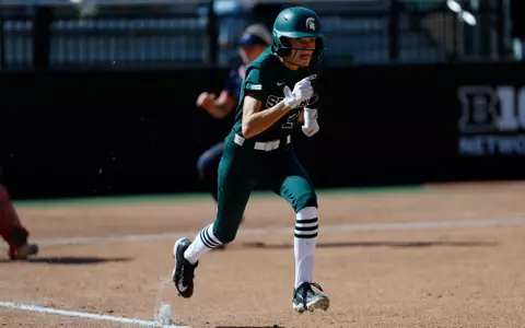 Ella Girard running to first at Secchia Stadium