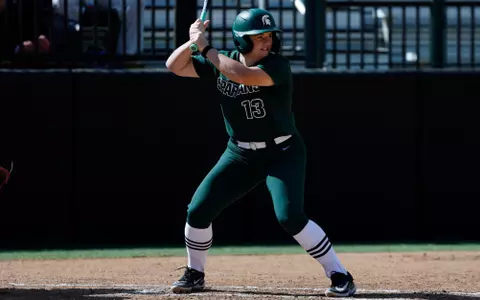 Presley Rivers at bat in a game against Detroit Mercy