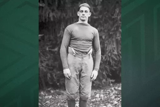 Photo of Blake Miller in his football gear on top of a green background
