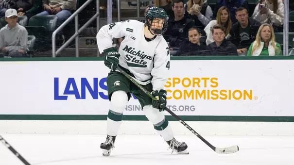 Brady Peddle handles the puck against Northern Michigan at Munn Ice Arena