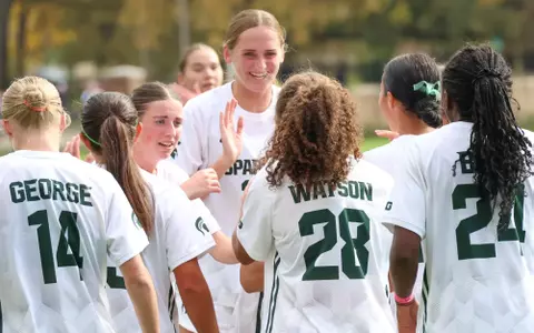 Addison Baldus celebrates a Renee Watson Goal