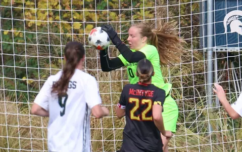 Noelle Henning makes a save vs. Maryland