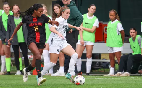 LJ Pearcy brings the ball up the left side vs. Maryland