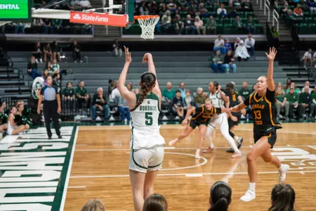 Monique Bobongie takes a shot at the Breslin Center
